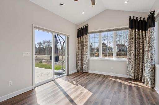 Sunroom walks out onto huge patio that was extended by the Sellers to maximize outdoor space and views.