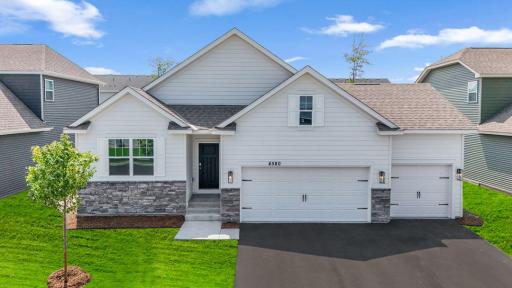 Welcome to the Dover II floor plan! Available as a to-be-built home in the Rivertown Heights neighborhood in Chaska. Photo is of a previously built home, finishes and layout will vary.