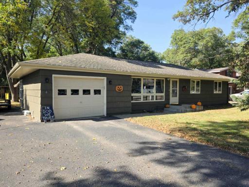 Welcome to 13699 Memorywood Drive! There is a one stall garage and an extra parking space along the north side of the home.