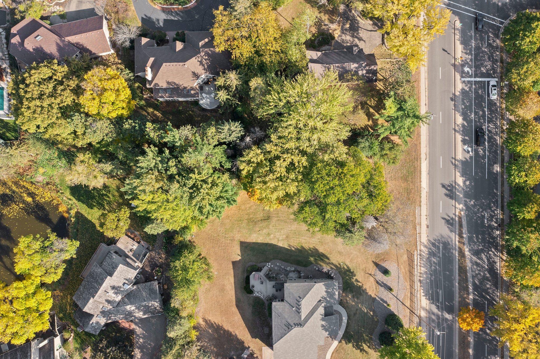 Set in the middle of other executive homes in an established neighborhood full of trees