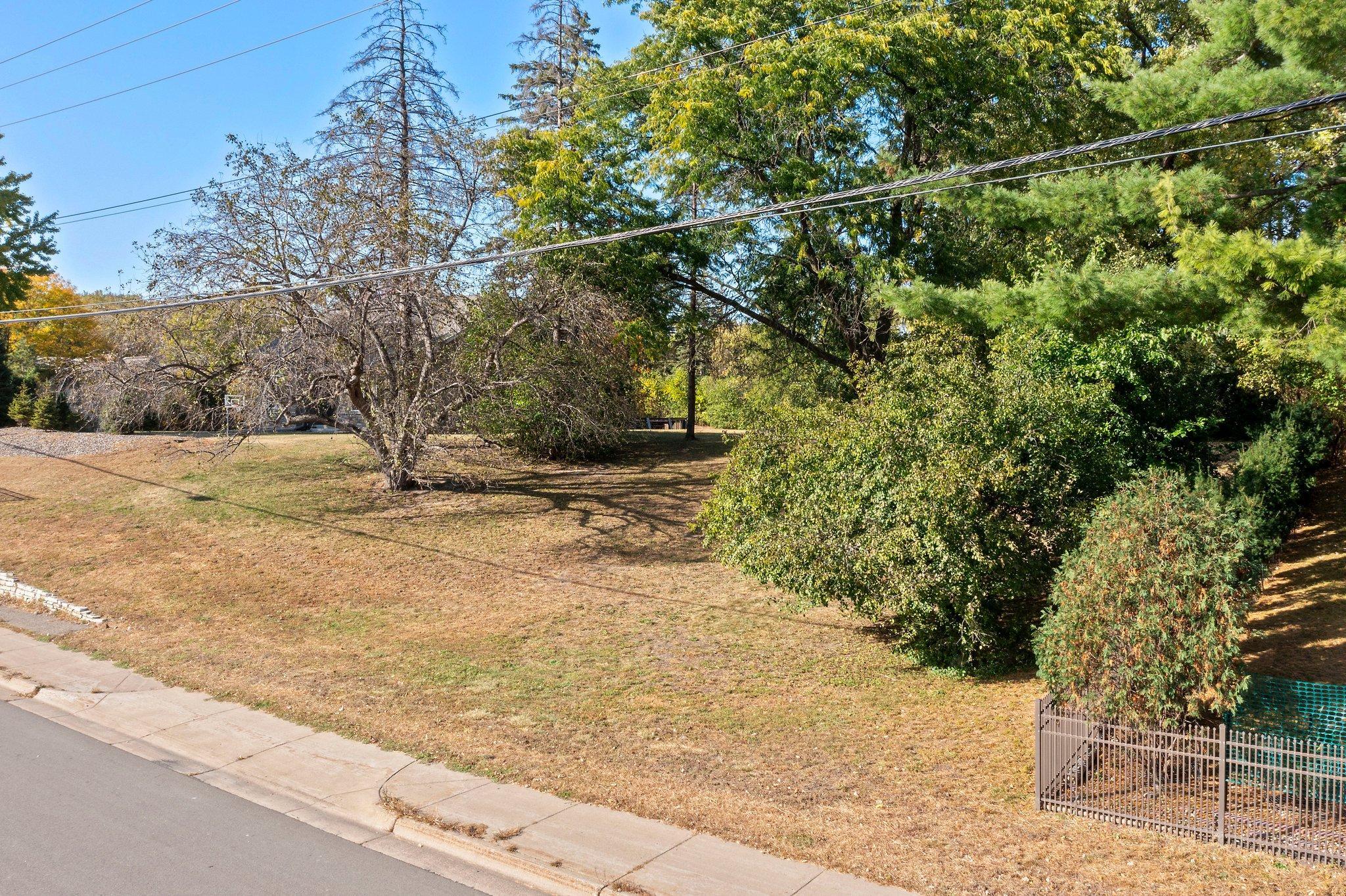 View from street of entrance to home site