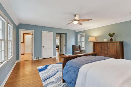 Primary bedroom has two closets and an attached 3/4 bath