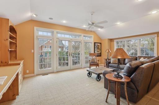 Second floor bonus/family room with french doors out to small deck.