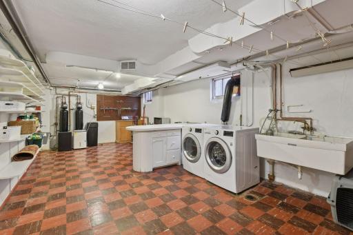 Lower level laundry with tons of storage.