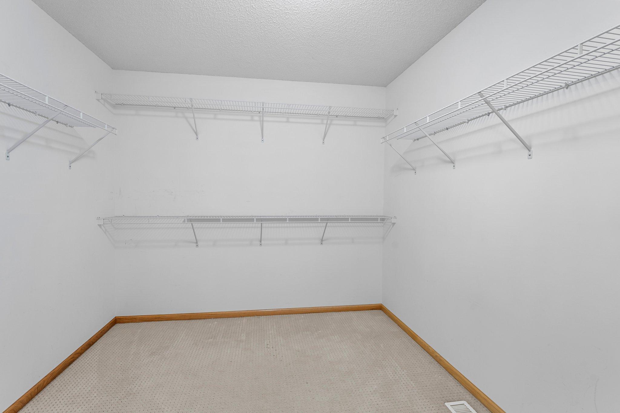 Walk-in closet in primary
