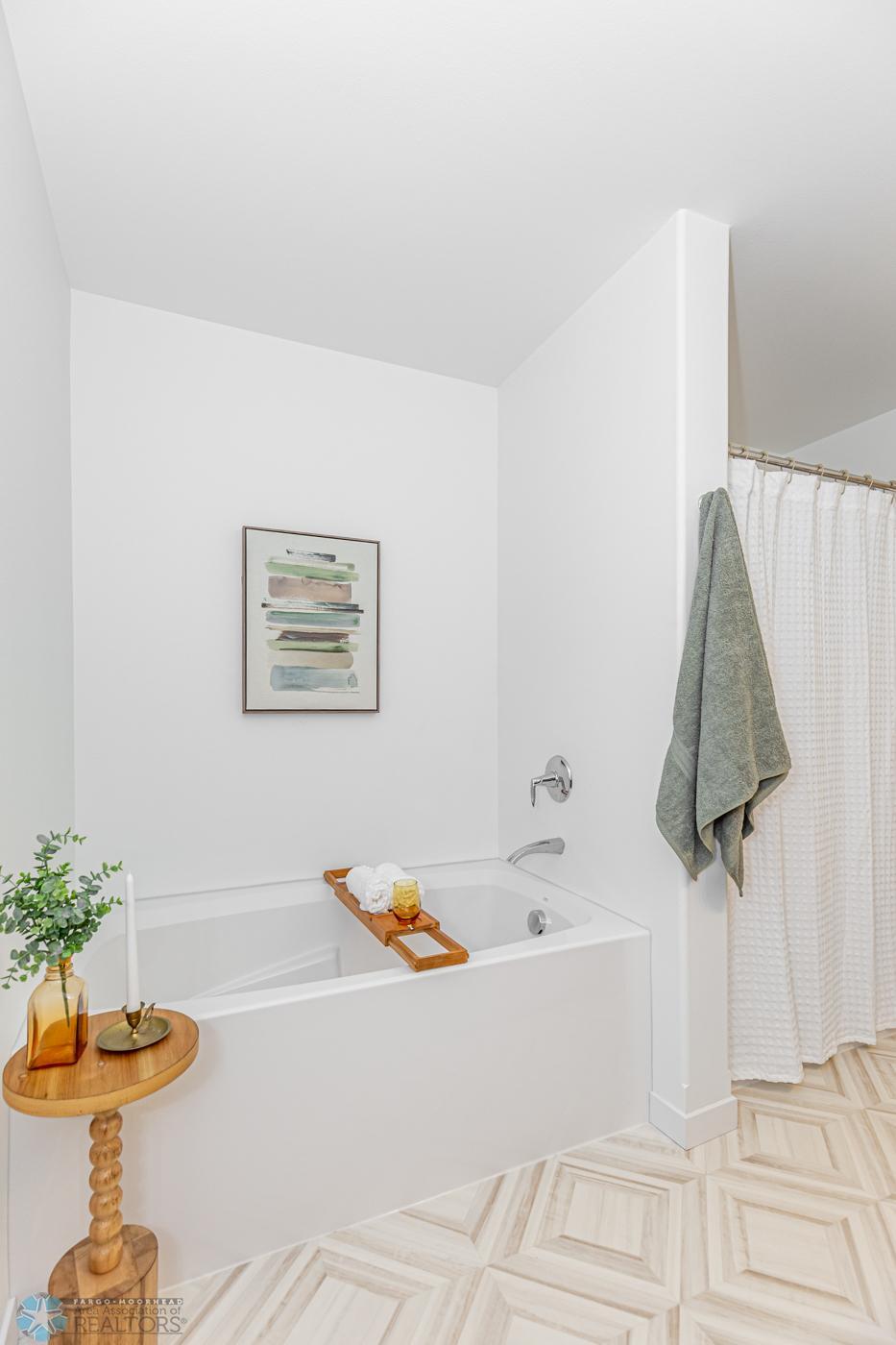 Primary Bathroom - Photo from previous model