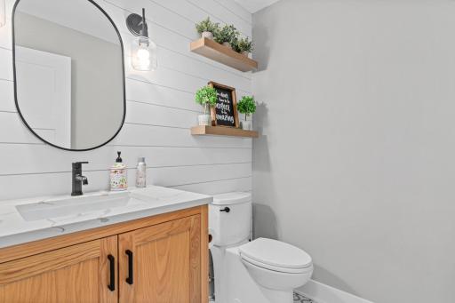 Main floor half bathroom, perfect for guests and easy access to the main living area.