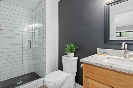 Beautiful 3/4 bathroom in the second bedroom upstairs.