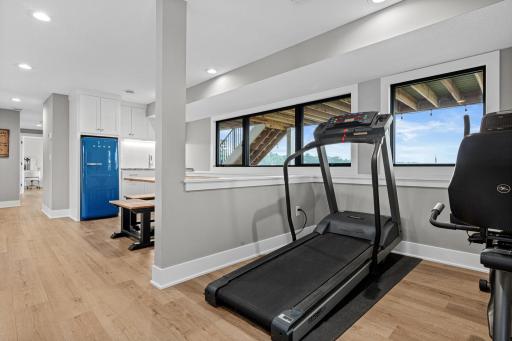 Workout in style and with a view! Overlooking the lake- could be another office or play space- the options are endless.