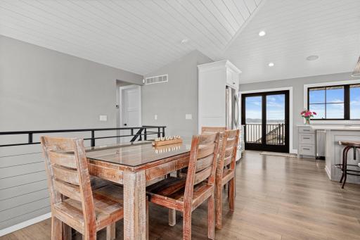 Dining space designed to effortlessly expand, comfortably accommodating both intimate dinners and lively gatherings with family and friends.