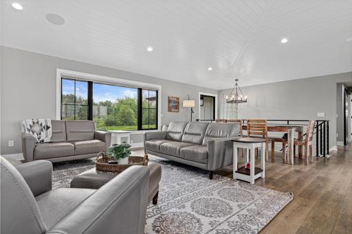 Upper level is perfectly situated for parties, gatherings and hanging out. Living room, dining space and kitchen flow seamlessly together.