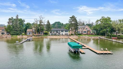 Crystal clear water, hard packed sand, gorgeous beach, flat yard, easy approach to the water and you haven't even gotten to the home yet!