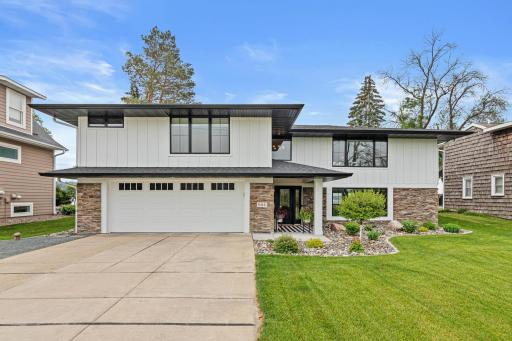 Stunning exterior with brand-new siding, roof, windows, and professional landscapingâevery detail thoughtfully updated for maximum curb appeal and lasting quality.