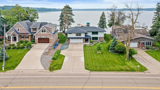 Long, flat driveway is perfect for guests and multiple vehicles. Perfectly maintained and cared-for lawn is in tip top shape. Extensive landscaping was done to compliment the interior.