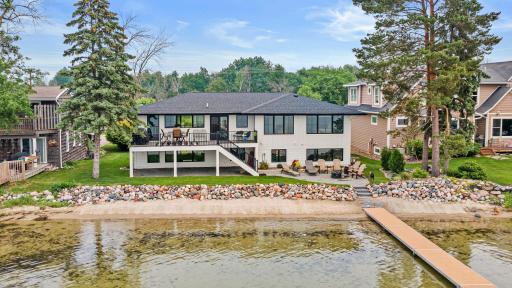 Absolutely incredible 4bd/4ba home located on one of the best lots on the lake. Sandy beach, shallow water that has the perfect drop off for skiing and fun. Completely remodeled in 2022- everything is new!