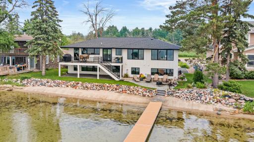 Enjoy lakefront living at its finest with a beautiful sandy beach, brand-new maintenance-free deck, and custom patioâperfect for relaxing, entertaining, and taking in the incredible views.