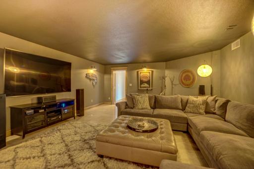 The lower level is an entertainerâs dream! Featuring a media/theater room with an 85" premium TV, an Onkyo stereo, and a state-of-the-art surround sound system, this space is perfect for game days or movie nights.