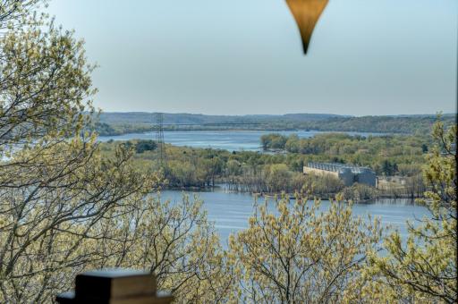 This extraordinary home offers stunning river views, luxurious amenities, and an unbeatable location, providing an unmatched lifestyle.