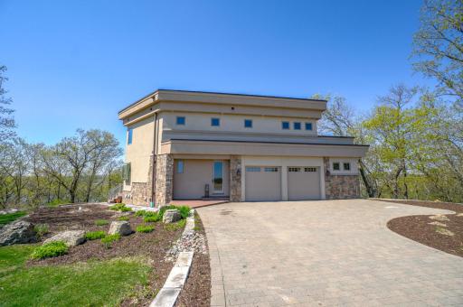 The property is as practical as it is beautiful, with a spacious heated garage, a paver driveway, and recently replaced river-facing windows. Located just five minutes from downtown Stillwater & Hudson, w/ quick access to the Twin Cities via High 36.