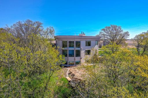 Step outside to enjoy the homeâs exceptional outdoor amenities. Relax on the walkout deck with maintenance-free decking, unwind on the upper-level deck, or host gatherings on the patioâall while soaking in the spectacular views of the river.