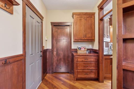 Another view of the mudroom with drop zone, and walk-in closet!