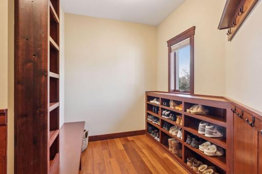 Amazing mudroom with bench and ample storage options!