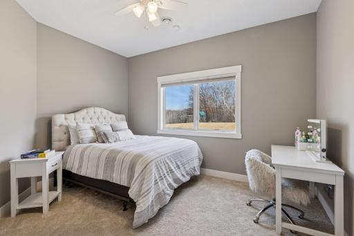 One of the four bedrooms on this level.