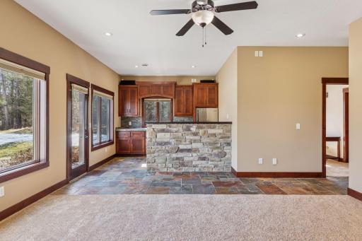 The pub style wet bar is a a great feature when you're entertaining, watching a movie or the big game!