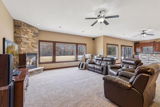 The walkout lower level features 9 + foot ceilings and an abundance of Andersen windows overlooking the yard.