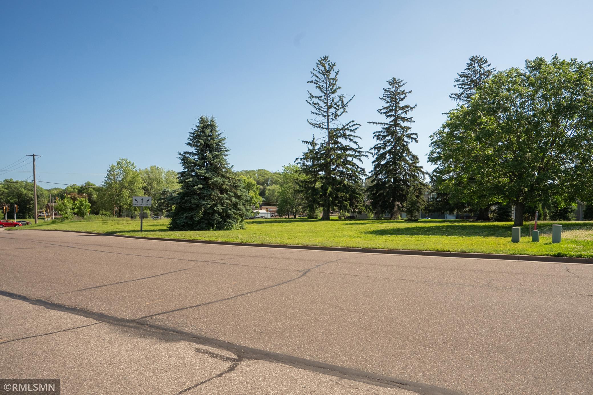Street view looking into the lot, providing perspective of the road frontage and access point.