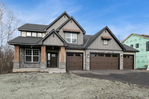 Photo is of the actual home. Welcome to the Snelling! Enjoy the stunning 4-car garage.