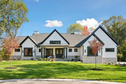 Welcome home to your custom estate on wooded acres.