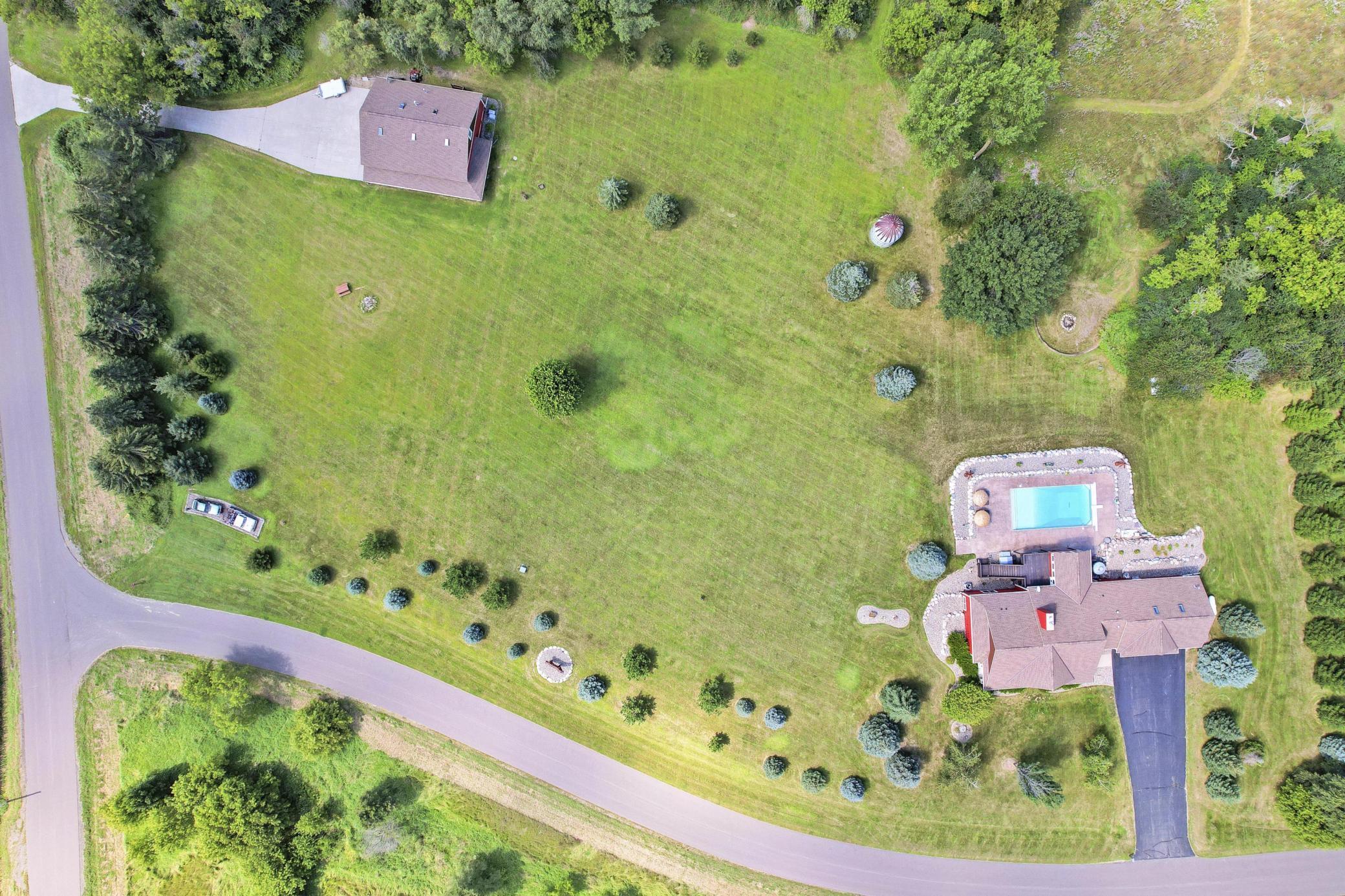 Discover the breathtaking beauty of this 10-acre retreat, where stunning views await you from every angle.