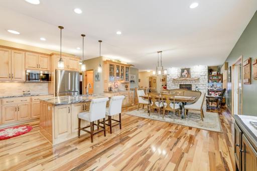 The kitchen is truly a chef's dream! With plenty of cabinets for all your storage needs and stylish stainless steel appliances, it's both functional and beauty. Plus, the built-in wet bar area makes it perfect for entertaining.