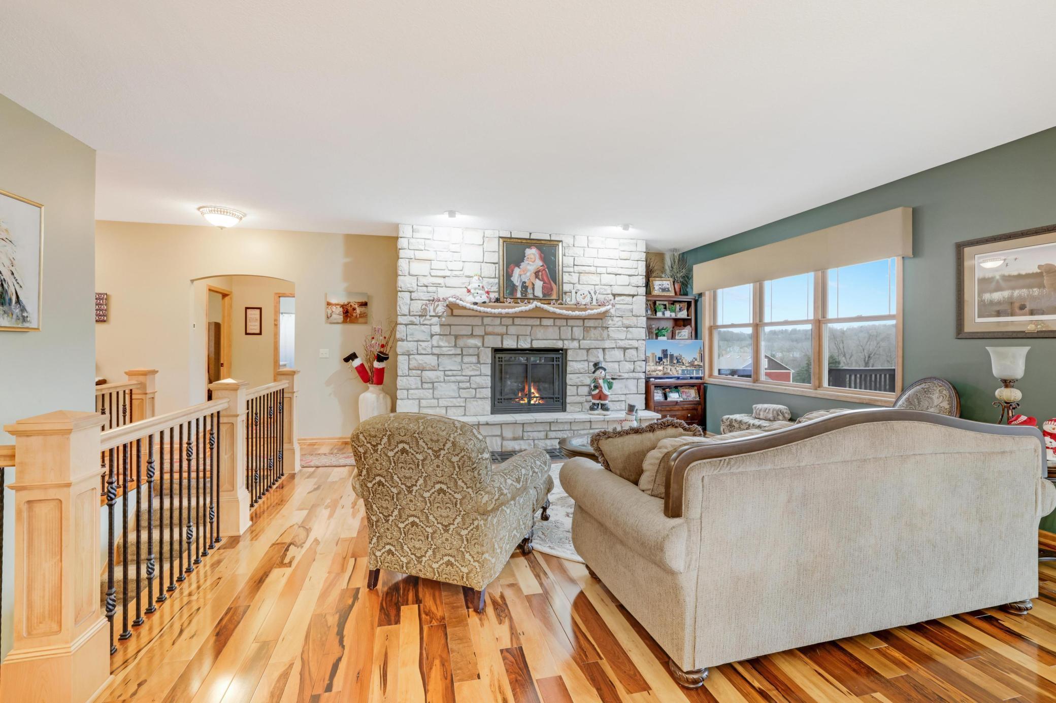 This beautifully designed main living area flows seamlessly into the spacious kitchen and informal dining area, creating the perfect backdrop for gatherings and everyday moment.