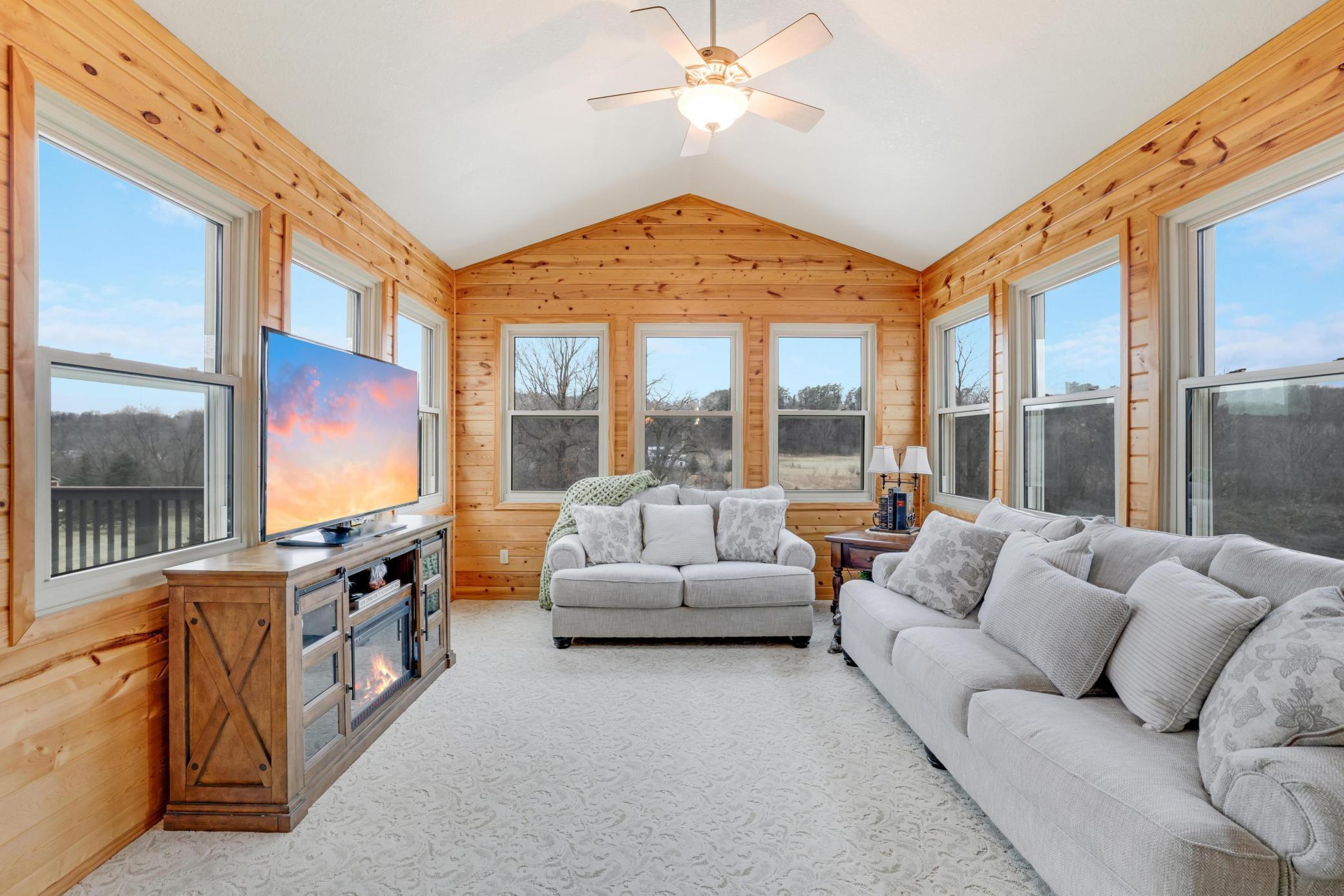 Imagine stepping into your own vaulted, wood-lined 3-season porch, where breathtaking views of your 10-acre retreat unfold before you. Opportunities like this are becoming increasingly rare.