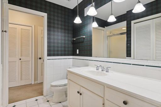 Upper level bedrooms 2 and 3 share this joint en-suite 3/4 bath