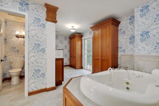 Additional highlights include built-in linen storage and oversized windows to bring in the outdoors