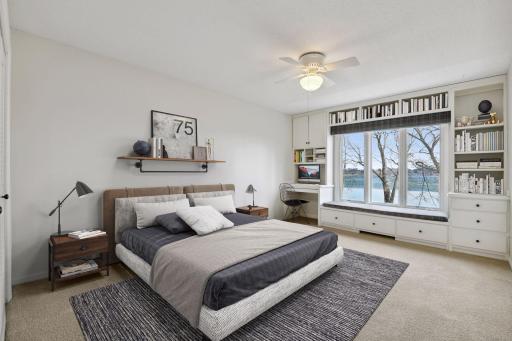 Bedroom with built-in bench seating and desk space