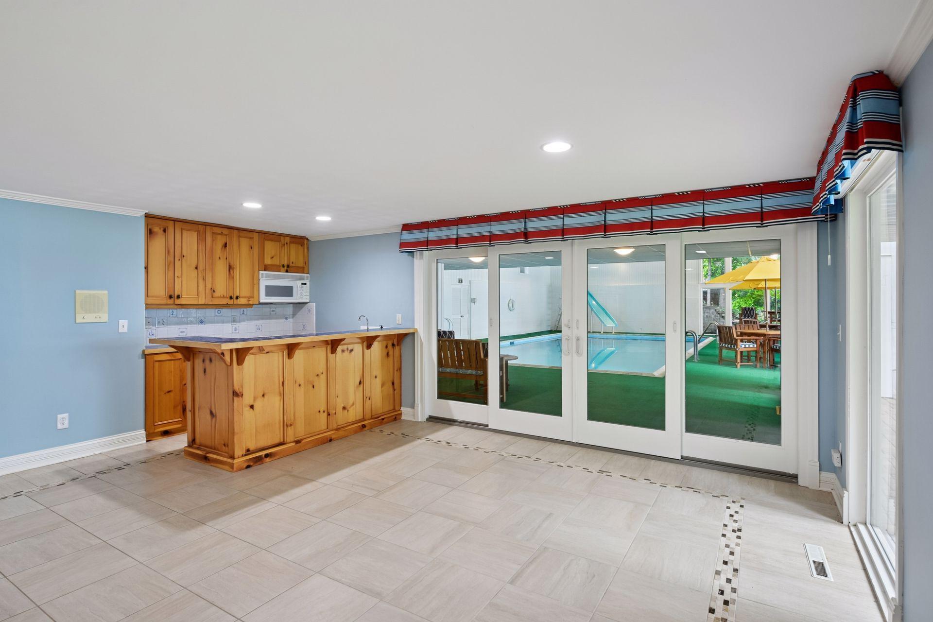 Conveniently located mini kitchen near the pool area for some quick snacks.