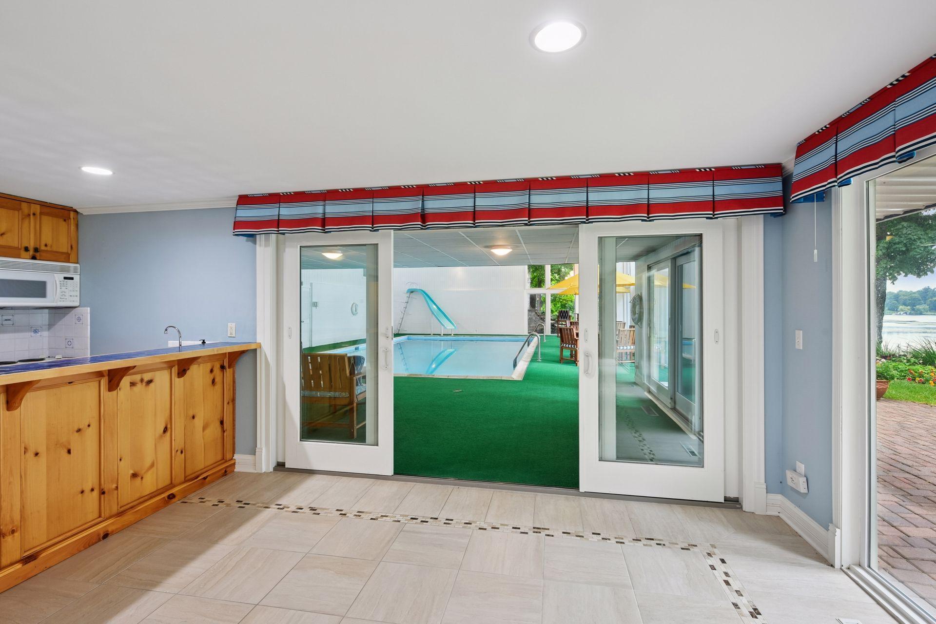 Easily access the indoor pool from the lower level