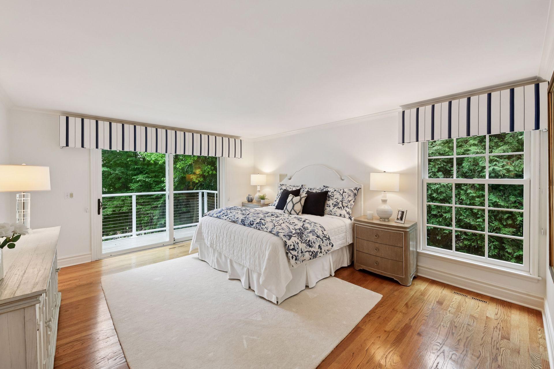 The primary bedroom suite is a quiet oasis to relax in