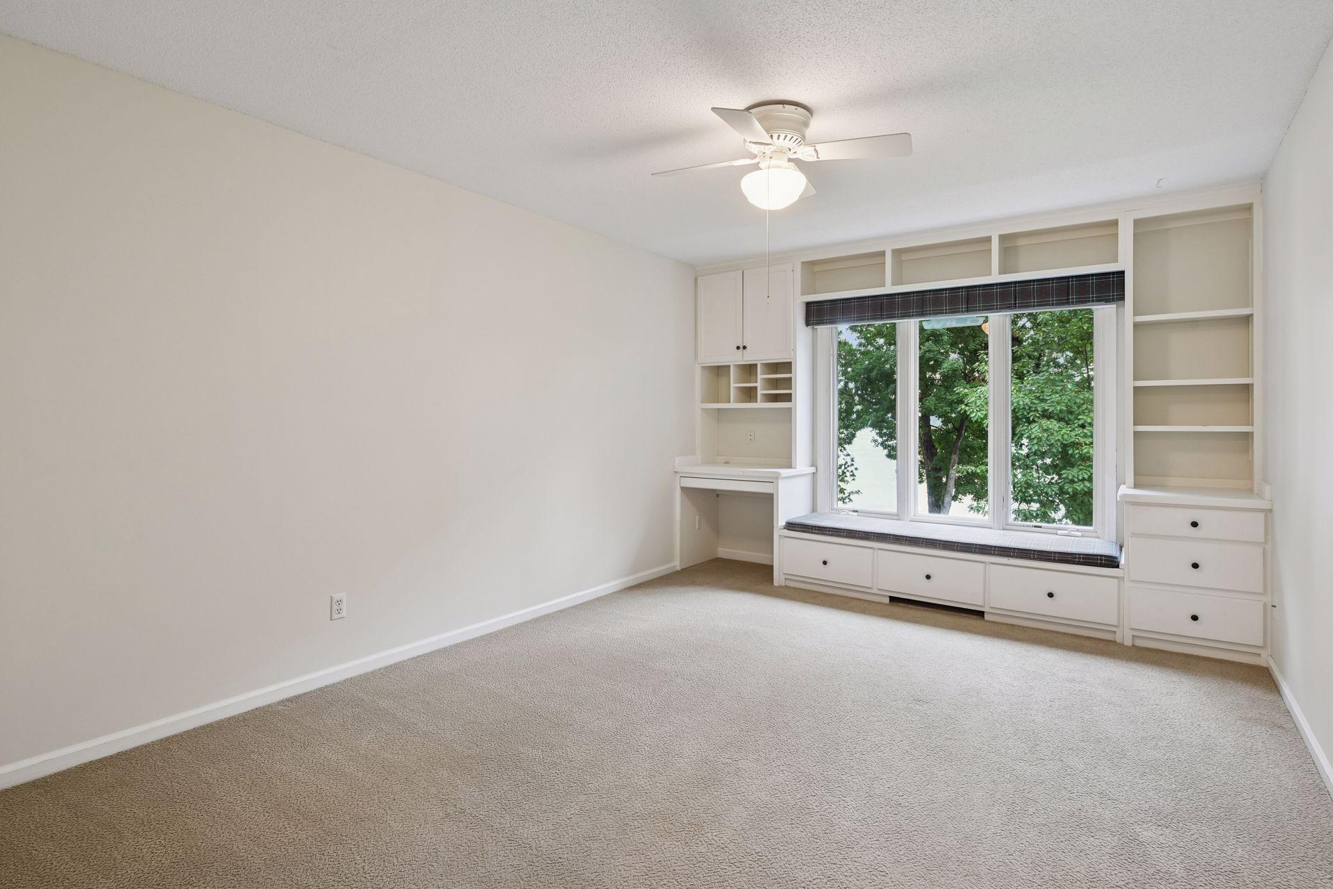 Enjoy the views of the lake from this built-in bench seating in the bedroom
