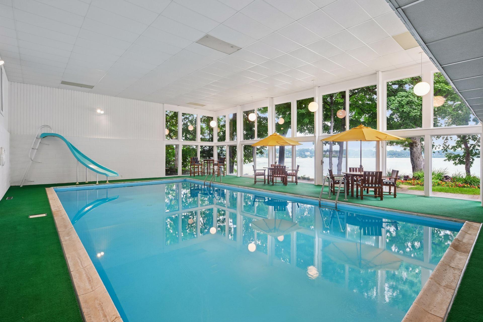 Imagine the fun you'll have with family and friends enjoying this classic indoor swimming pool oasis