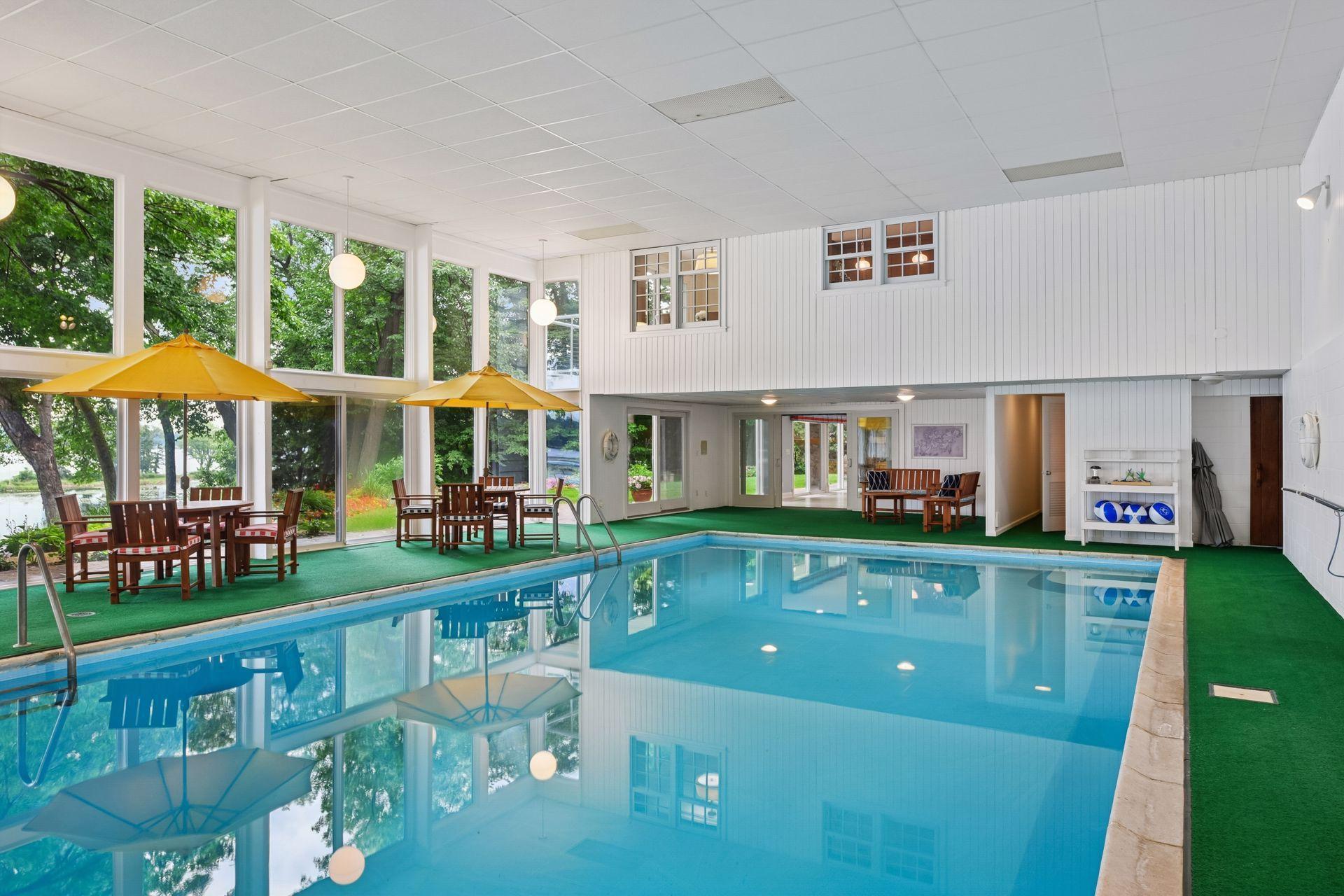 This space also features two changing rooms, 3/4 bath, and pool mechanical room