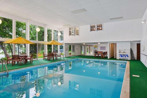 This space also features two changing rooms, 3/4 bath, and pool mechanical room