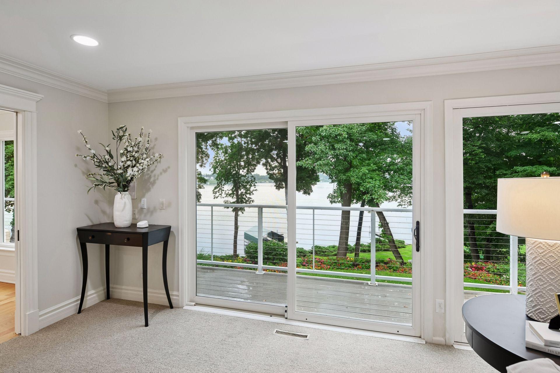 Expansive sliding doors lead you to the balcony in addition to flooding this space with natural light