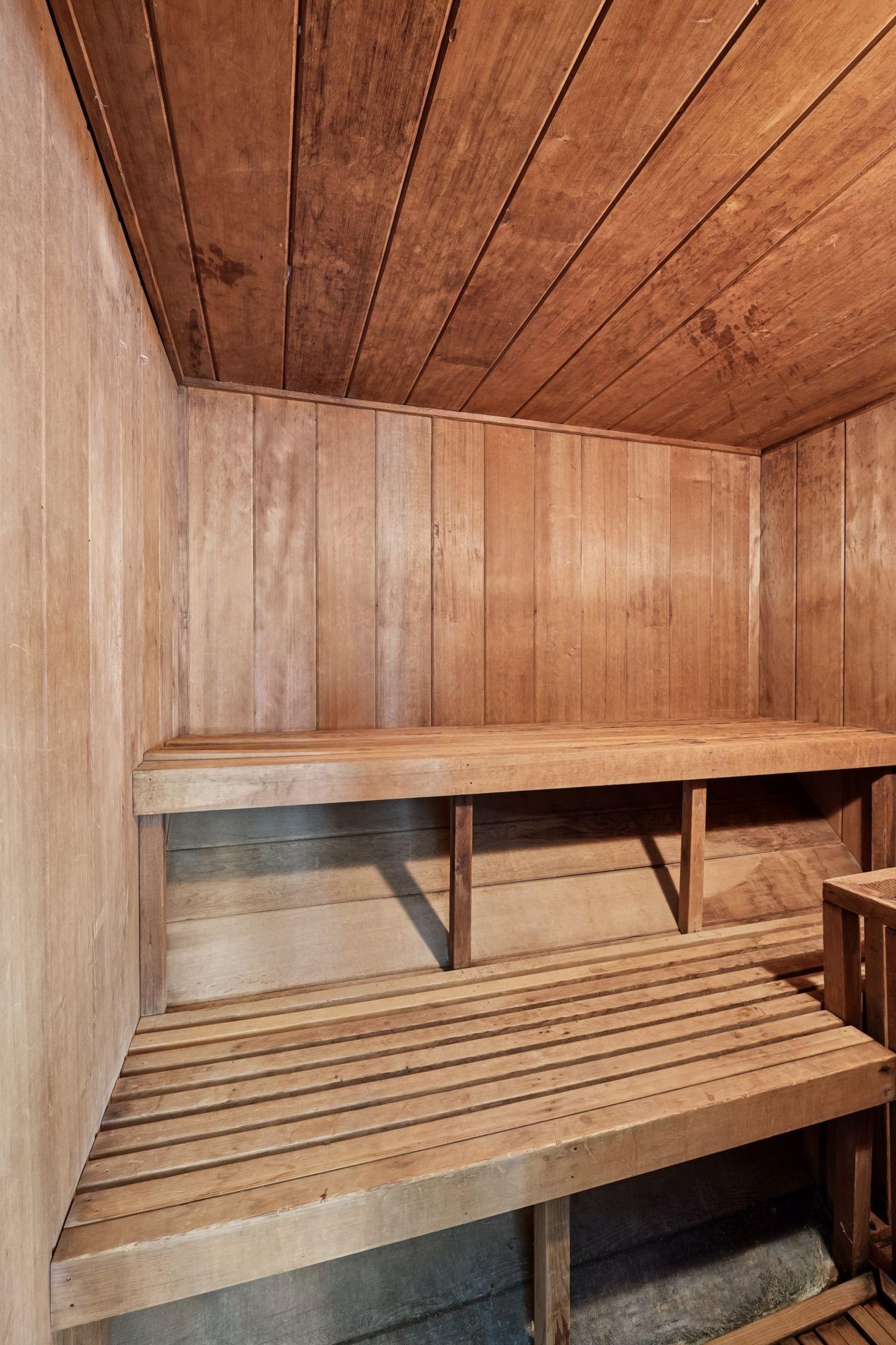 Tucked in the pool area is a sauna