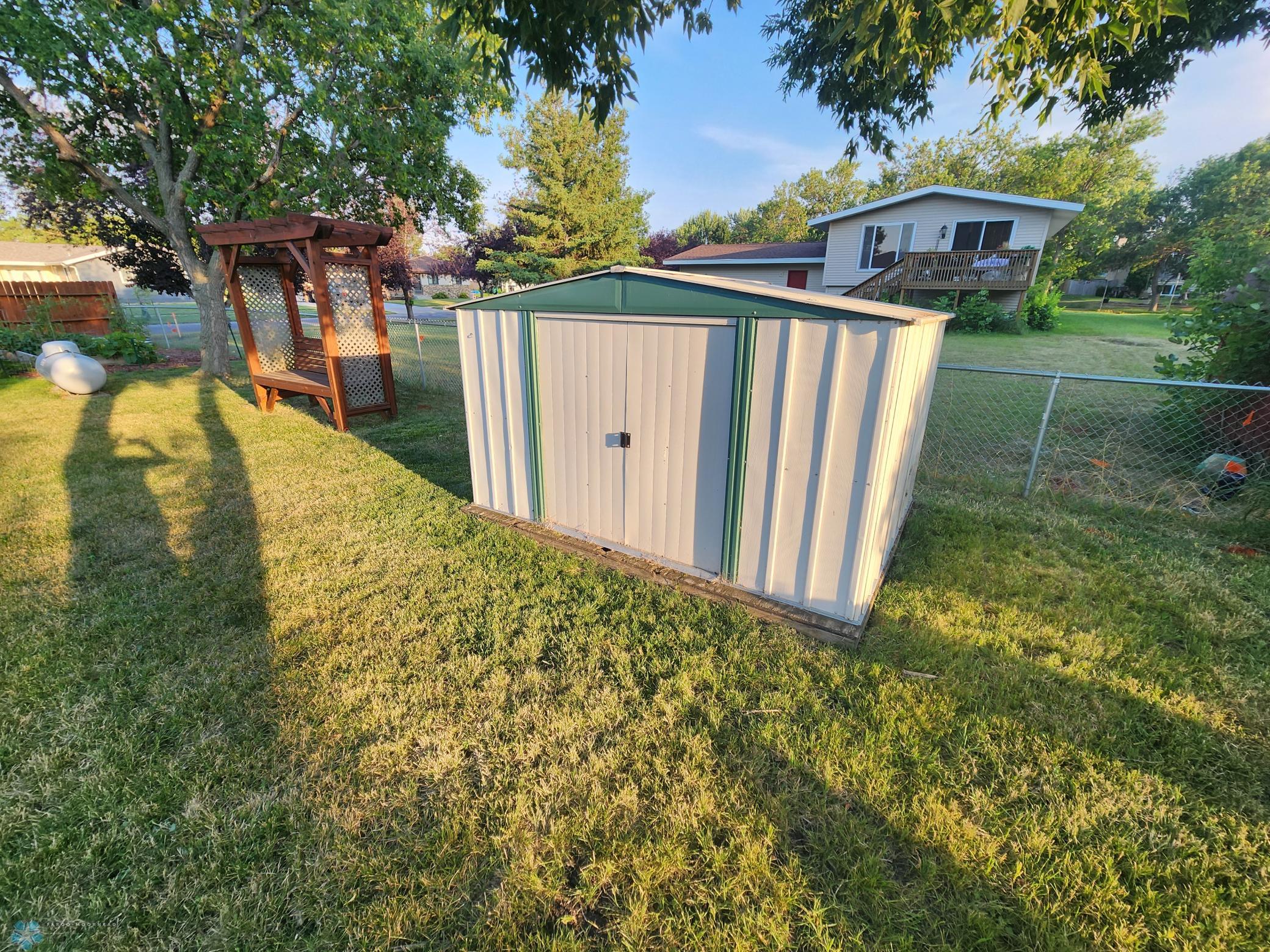Storage shed included