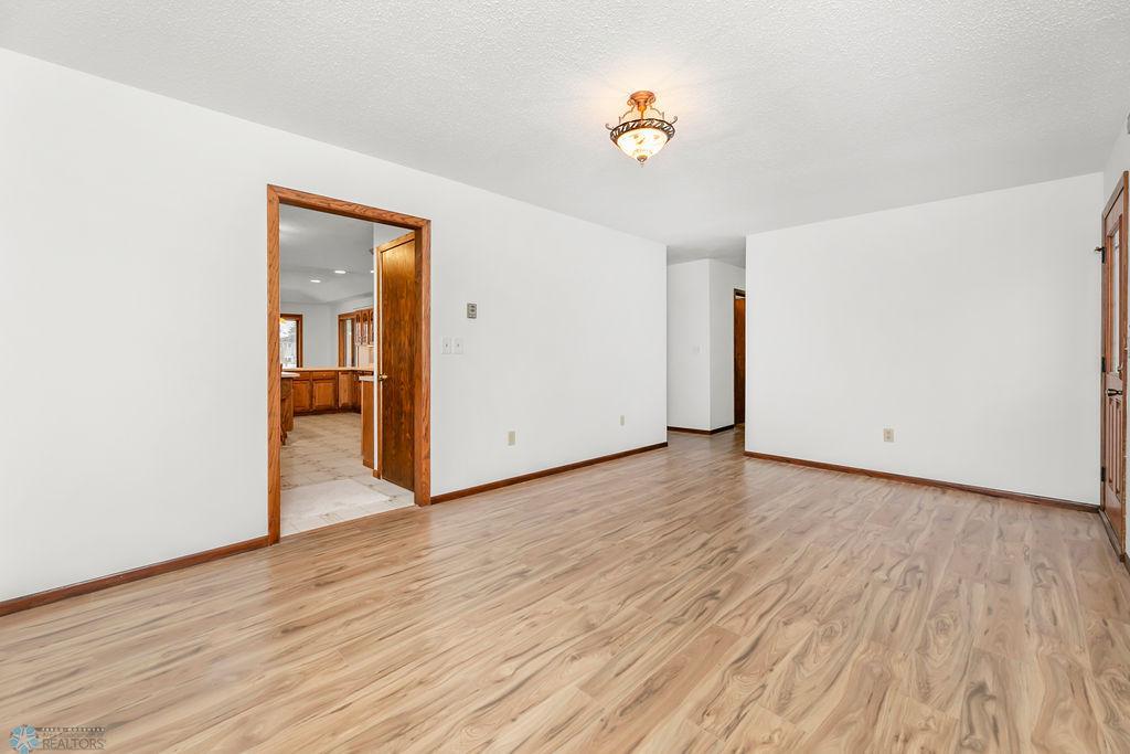 Front living room to Kitchen area & Hallway to Bedrooms